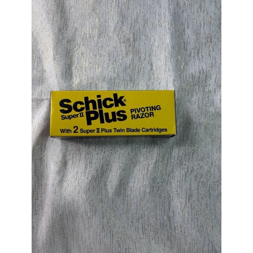 vintage Schick Super II Plus Pivoting Razor with 2 Super II Plus Twin Blade Cart